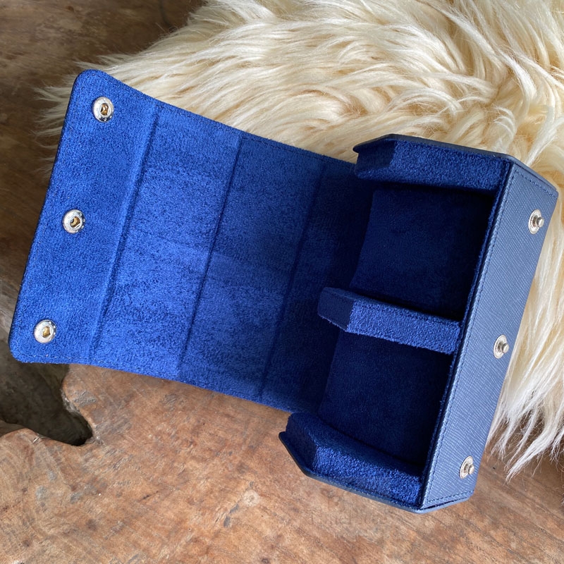 opened hexagon shaped watch case showing the side with velvet with two slots for watches.